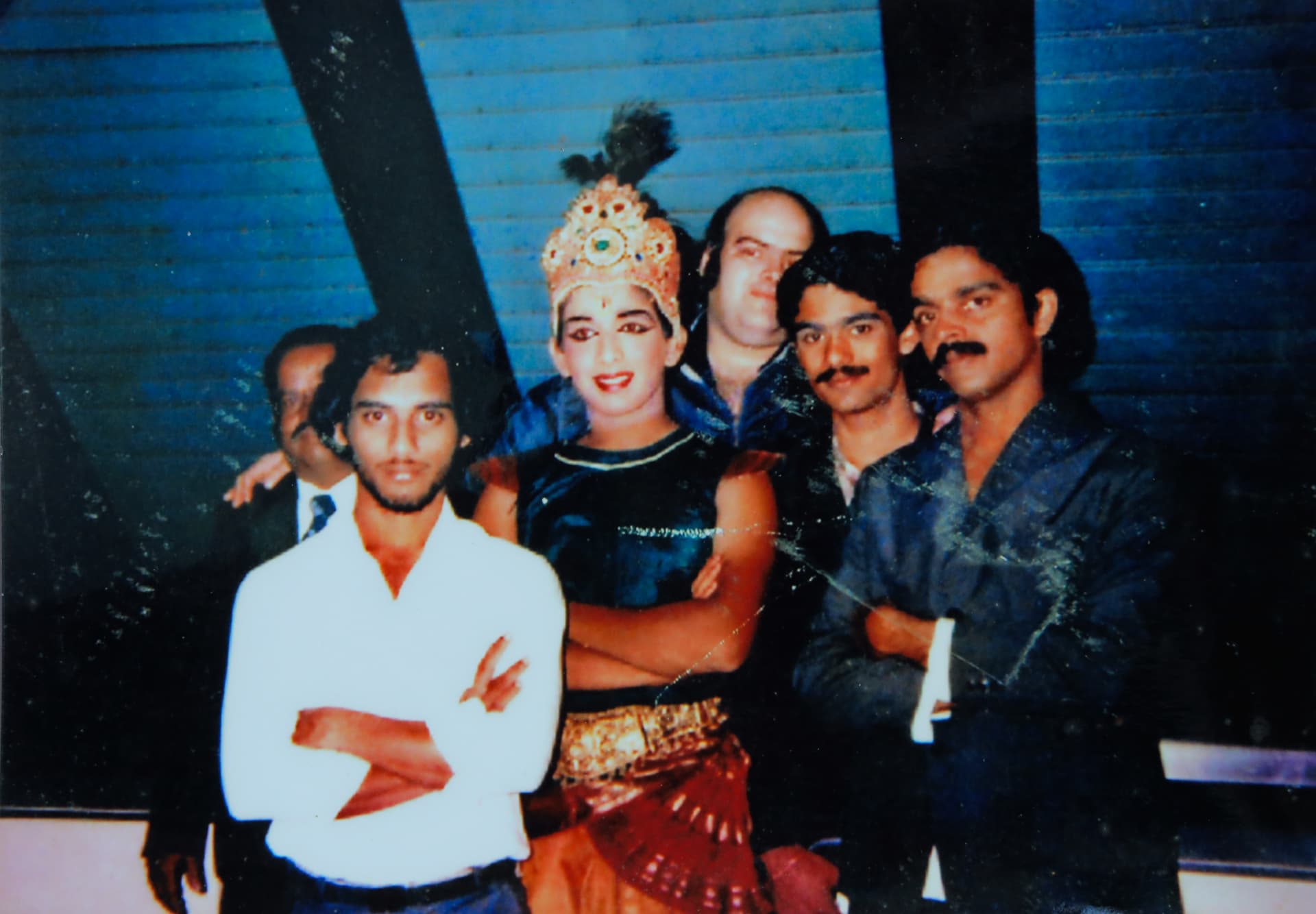 A vintage group photograph of the performing troupe with Vineeth, moments after a performance on the Europe tour